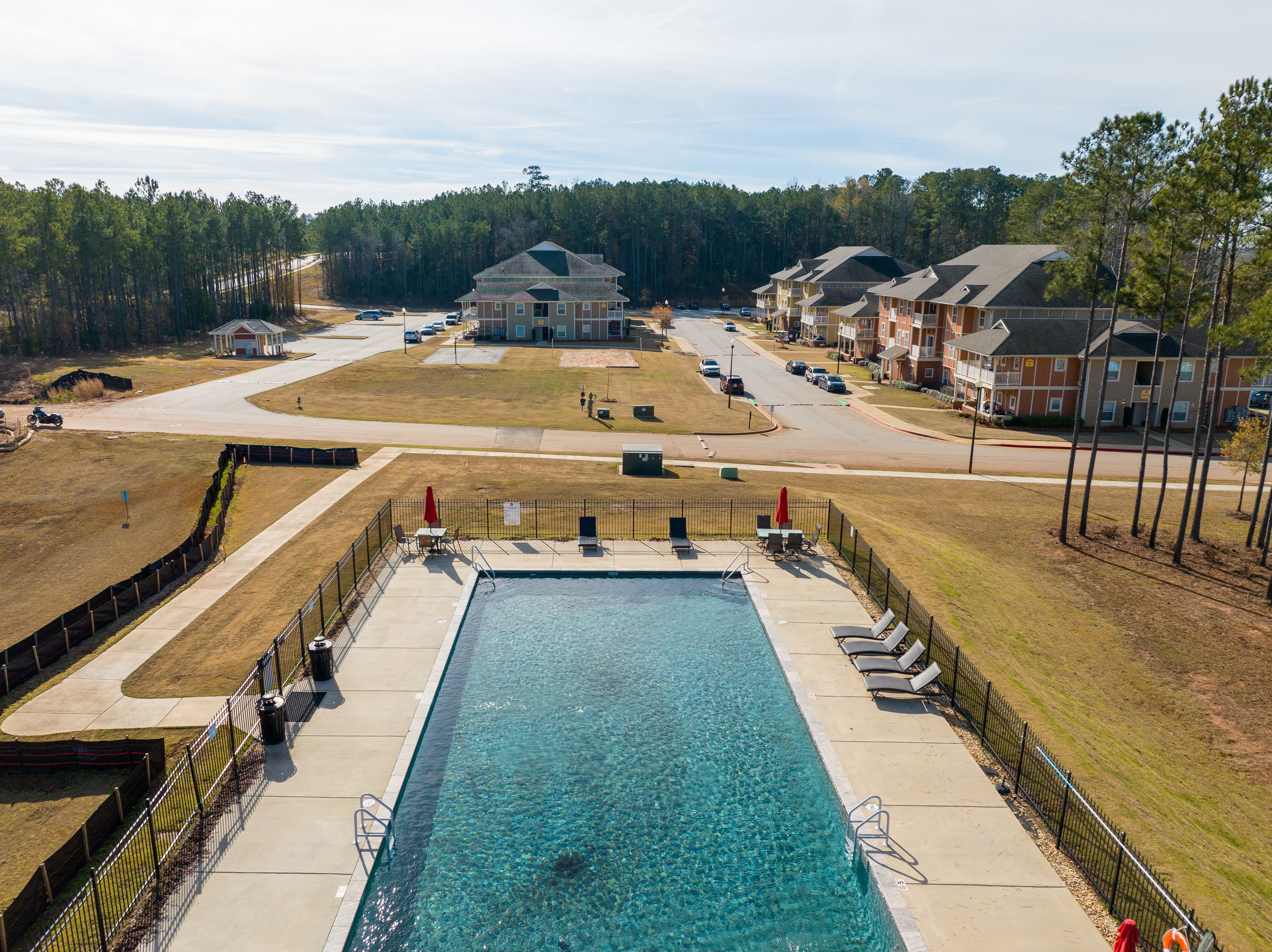 Outdoor pool and lounge at Abbey Glen